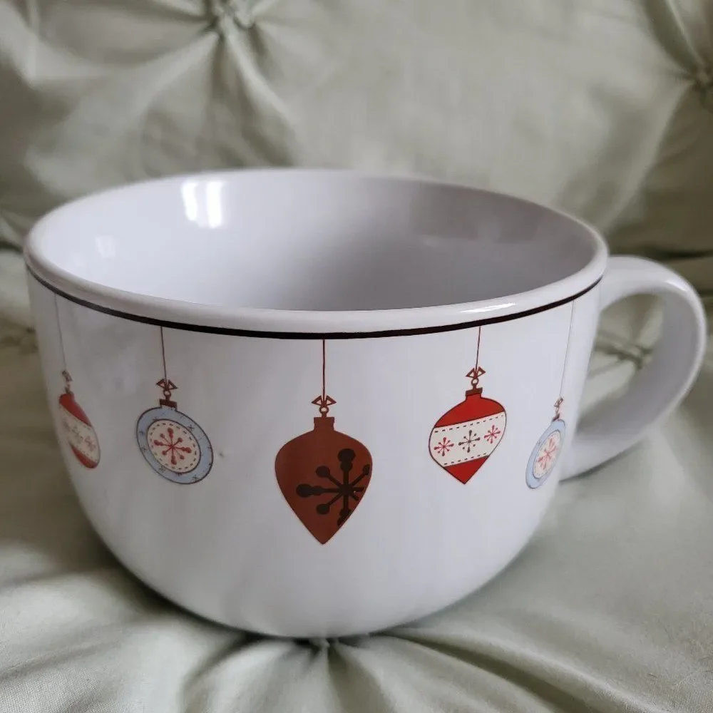 Oversized Holiday coffee mug by Design Pac with cute ornaments around the rim